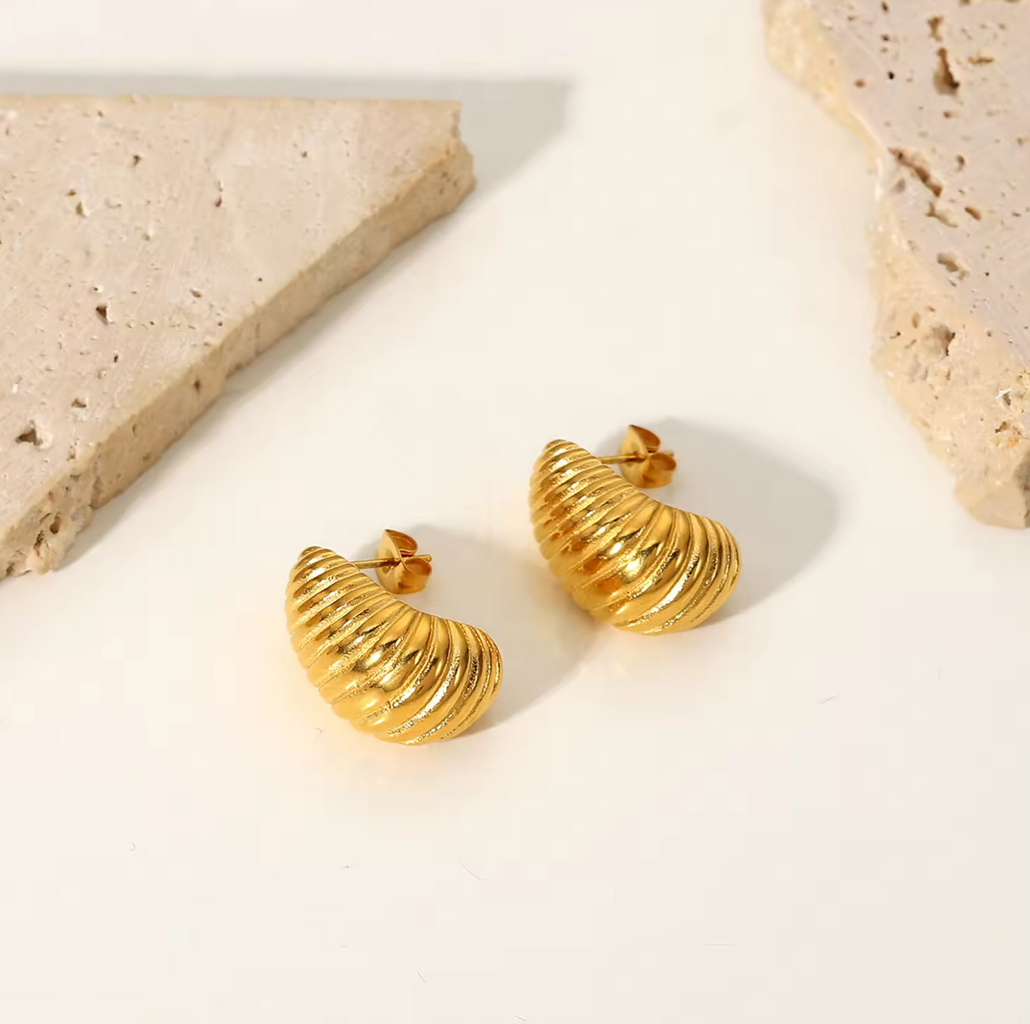 aretes de gota twirl en acero inoxidable