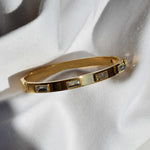 brazalete dorado rigido acero inoxidable