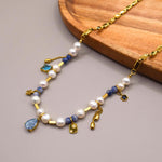 collar de perlas naturales con piedras naturales, detalles en acero inoxidable, collar de acero inoxidable, joyería, joyería mexicana, joyería en acero inoxidable 