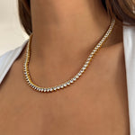 collar tennis dorado con zirconias