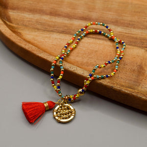 pulsera rmulticolor de cuentas con baño de oro 18k y motitas