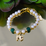 pulsera perlas naturales, pulsera elefante con perlas, pulsera de la suerte, pulsera baño de oro,  joyeria de plata, joyeria de eventos, joyeria de bodas, aretes hipoalergénicos, joyeria hipoalergénica,arete de moda, accesorios, joyeria de moda, bisutería, joyería mexicana, joyeria, joyeria trendy 